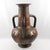 This monumental handmade baluster-form urn vase with handles was made in Italy in the 1960s. The hand-worked details on...