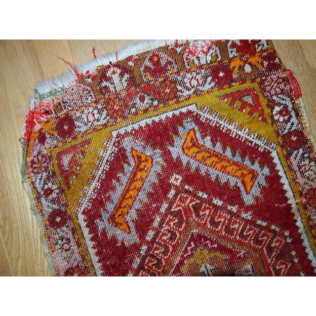 Antique Turkish Yastik rug in original condition. The rug was made in traditional design for its type in bright red colour...