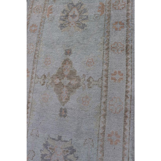 Early 21st Century Long Turkish Oushak Runner in Ivory With Faded Green and Terracotta 2'10 X 21'0 For Sale - Image 5 of 13