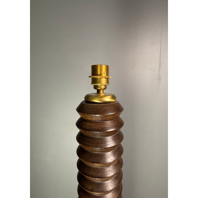 Lovely French "low" chunky floor lamp in wood turned oak with vintage rope shade, France ca 1950s. This floor lamp has...