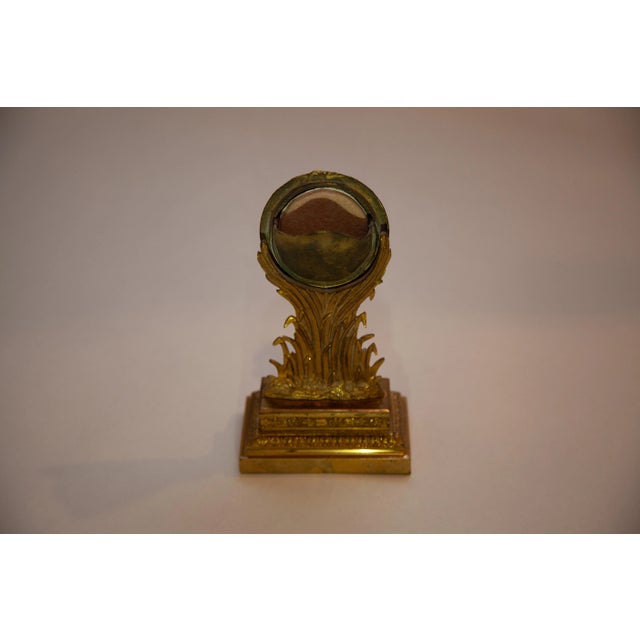 Antique French Waited Holder. Pocked in back to hold watch. Very interesting. Bird coming through the cattail and foliage...