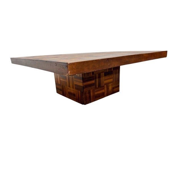 A distinctive Mid-Century Modern coffee table featuring a beautifully crafted butcher-block parquet walnut surface...