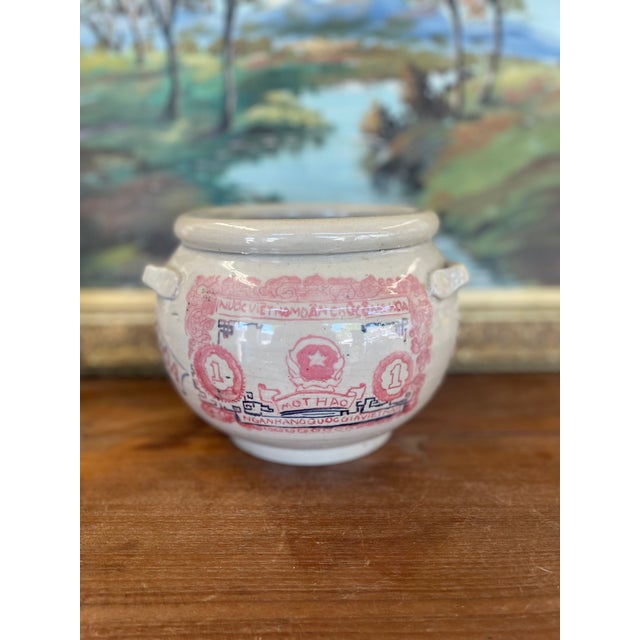 This distinctive Vietnamese studio pottery jar is a hand-thrown and hand-painted piece featuring a highly detailed...