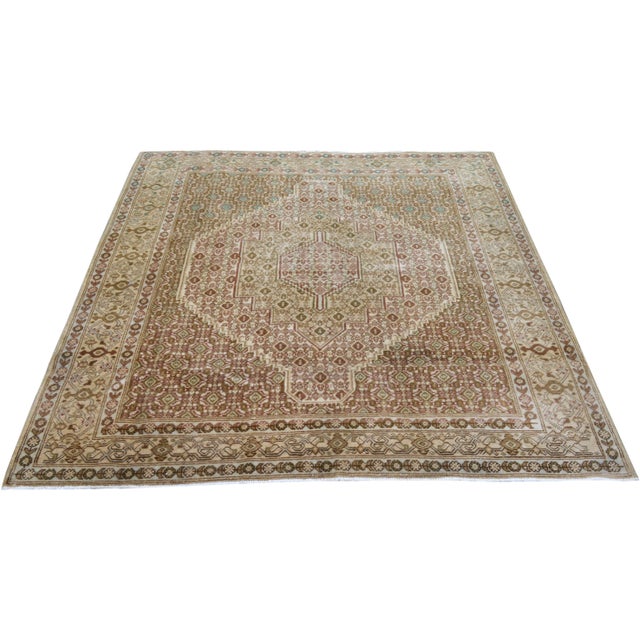 Hand-knotted with care using traditional rug making techniques, this wool rug blends timeless craftsmanship with a modern...