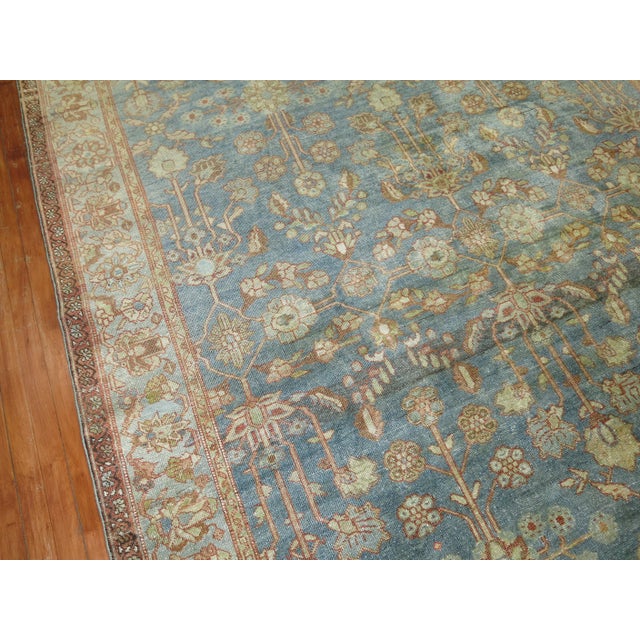 Stunning Persian Malayer Room size rug with a water blue field accents in terracotta and soft green in excellent condition...