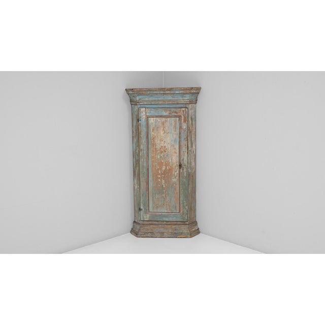 This 1820s Swedish Gustavian corner cabinet embodies the understated elegance and symmetry of the Gustavian period....