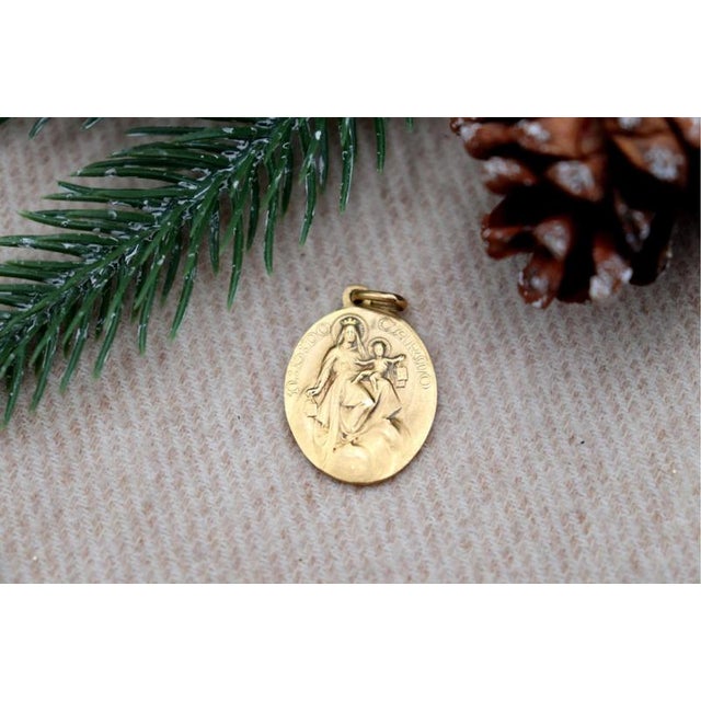 19.2k Gold Our Lady of Mount Carmel and Sacred Heart of Jesus Pendant, in Worn conditions. Designed 1980 to 1989