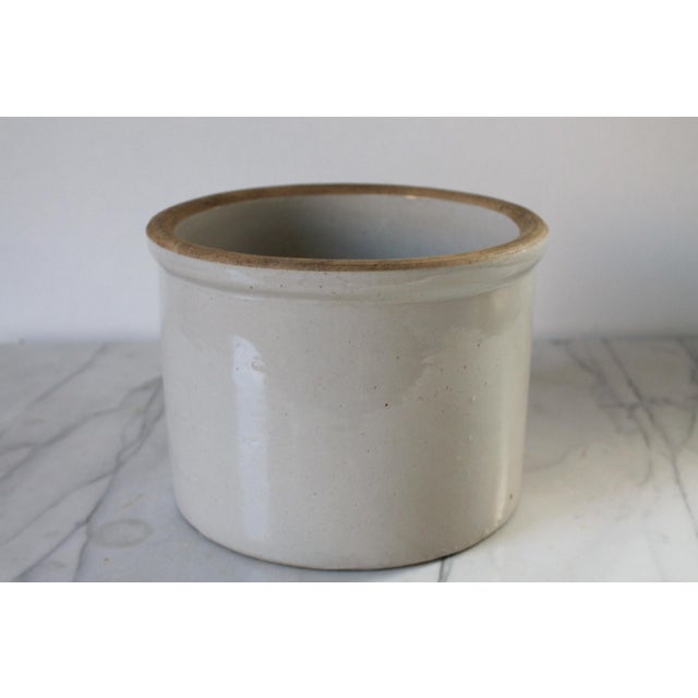 Farmhouse style rustic cream colored stoneware crock. Marked USA on bottom. One chip on bottom. Pictured. Some other...