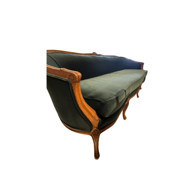 An elegant vintage French Provincial sofa, beautifully reupholstered in luxurious deep green Kravet velvet. Combining...