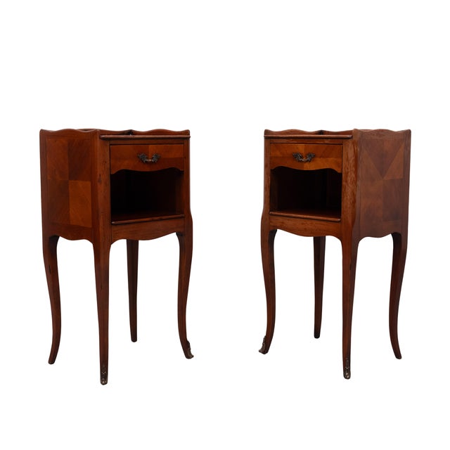 Very nice pair of elegant Nightstands. Marquetry inlay wood and Nutwood Nice warm color. One drawer each. France 1950s