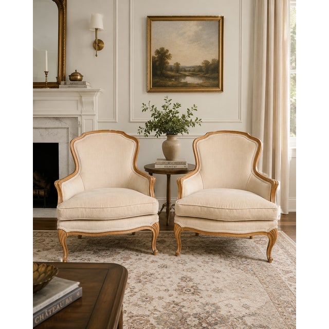 A stunning pair of Bergère armchairs by Meyer Gunther Martini, crafted in the timeless French Provincial tradition with...