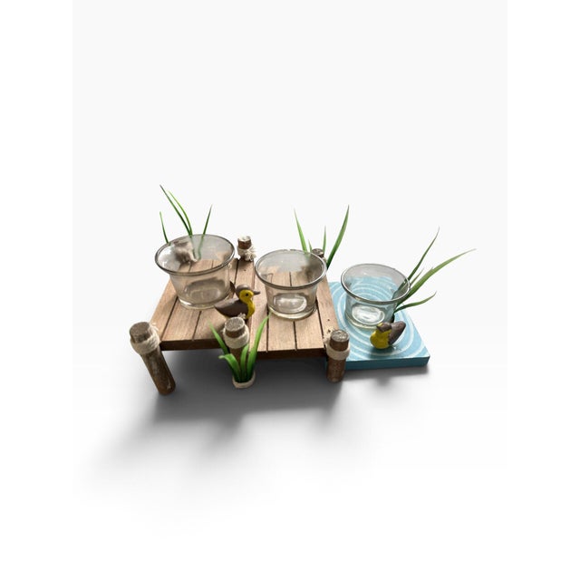 Charming vintage Nantucket Home tabletop votive holder featuring a rustic tiered wood platform with three permanently...