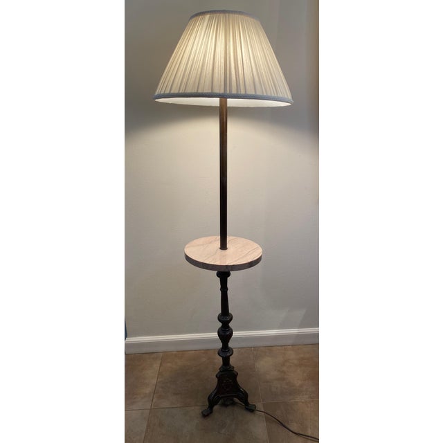 This was my grandfathers reading lamp. He had a substantial library and a book and pair of glasses were always on the...