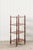 This Victorian Rosewood Whatnot showcases four tiers of scalloped-edge shelves supported by finely turned baluster columns...