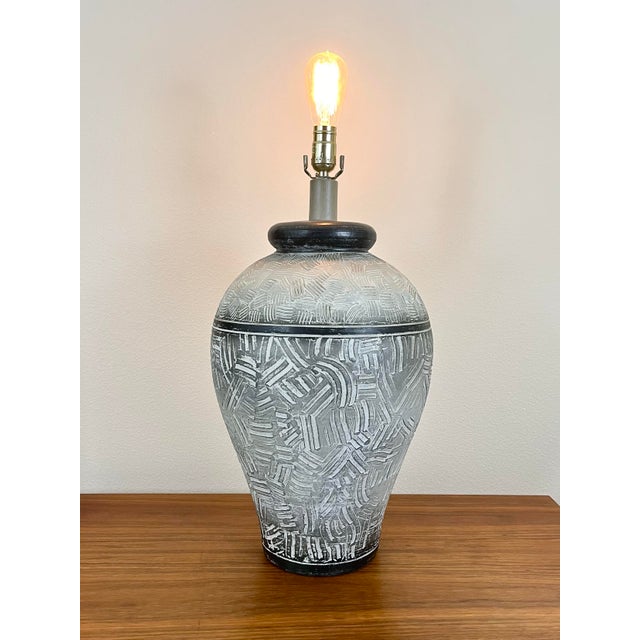Large Ceramic Table Lamp With Engraved Details by Casual Lamps of California, 1985. This is a larger lamp with an...
