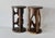 Vintage African hand-carved hardwood accent tables or plant stands featuring figural character carvings with round top and...