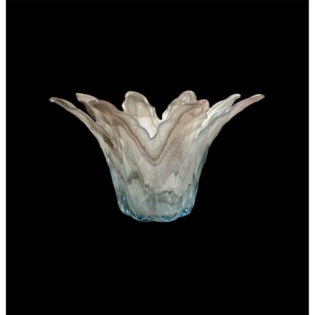 This is a lovely hand-blown glass vase with swirls of mauve and gray in its delicate lotus shape. There are no markings,...