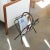 Incredible iron and leather magazine rack in the style of Jacques Adnet from France, 1940's. Original heavy black iron...
