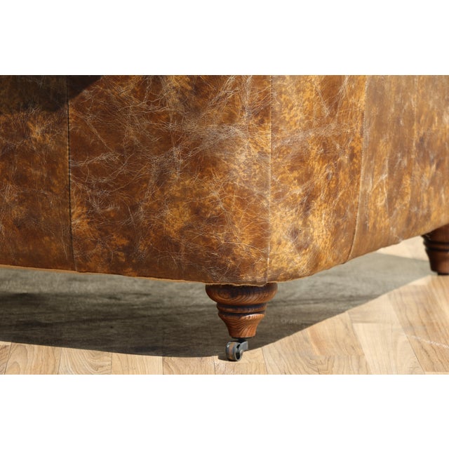 Industrial Distressed Brown Leather Chesterfield Sofa – Three Seat Tufted Sofa With Nailhead Trim & Casters For Sale - Image 13 of 18