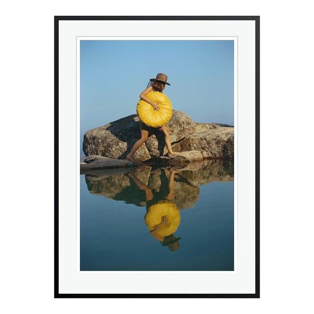 Finding a Spot 1973 by Slim Aarons Framed C-Print For Sale