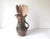 This pitcher is stunning. The colours are hard to describe due to the unique raku process which gives it a slight metallic...