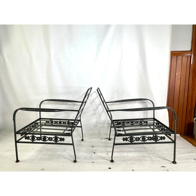 For sale is this great pair of vintage CastIron outdoor chairs in the style of Woodard. The chairs are very well Made