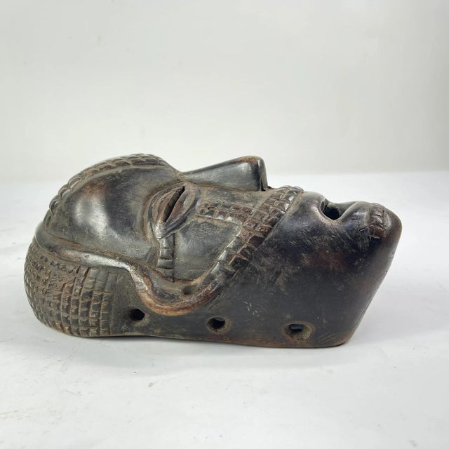 Early 20th Century Tabwa Wood Mask with Awl Holes For Sale In Denver - Image 6 of 6