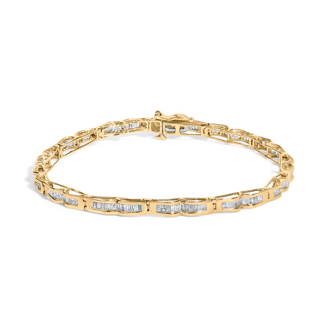 A ribbon of sunshine wrapped around the wrist, this polished 10K yellow gold bracelet turns everyday moments into small...