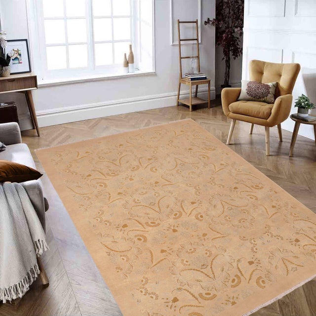 Enhance the ambiance of your home with this magnificent Persian-influenced Turkish hand-knotted rug made by skilled...