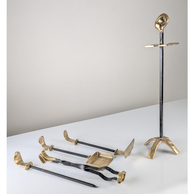 Brutalist fireplace tool set consisting of a stand and four tools, designed and hand-wrought by David Marshall during the...
