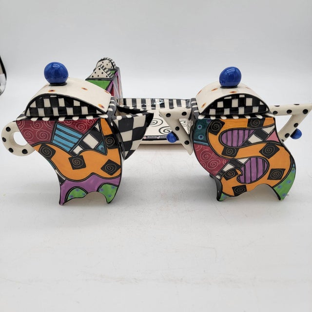 Steven McGovney with Tammy Camarot created a successful line of wildly painted table top items and one of a kind...