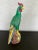 A striking vintage Chinese ceramic rooster featuring a rich emerald green glaze with hand-painted accents in burgundy,...
