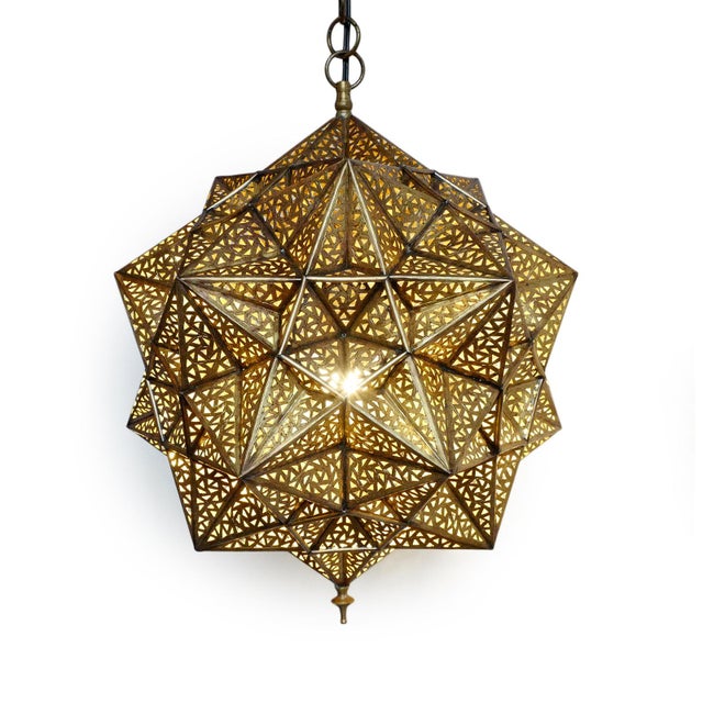 Vintage Indian brass pendant light is masterfully crafted, formed from a complex constellation of faceted, hand-pierced...
