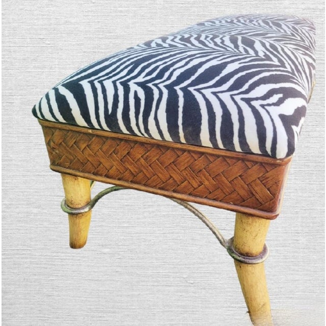 A beautiful upholstered black and white zebra fabric end of the bed bench. by Maitland Smith. The bench is not marked...
