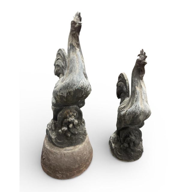 Charming pair of vintage cast lead rooster statues with a naturally weathered, zinc-like patina. Each figure features...