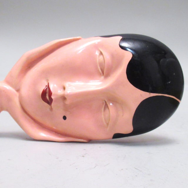 Face Mirror from Lisolachenoncè, 1980, in Very Good conditions. Designed 1980 to 1989 This piece has an attribution mark,...