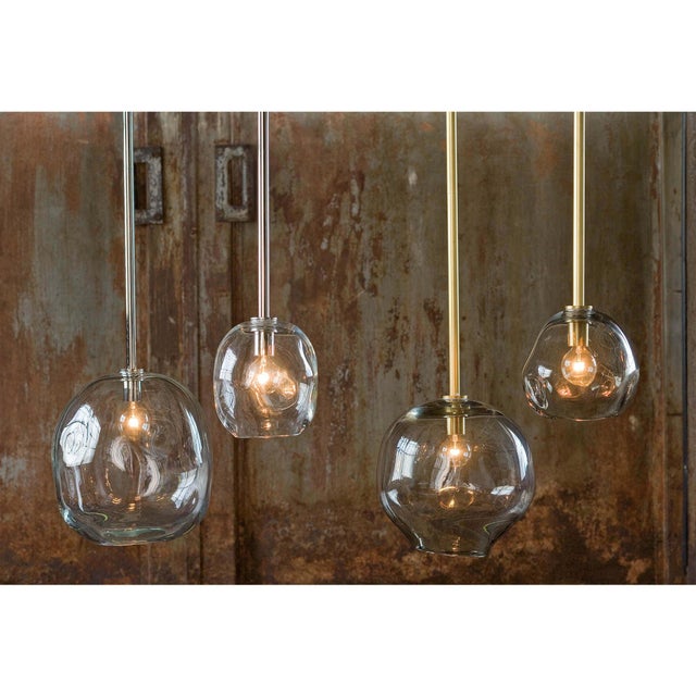 Smoke glass molten glass has an inherent beauty of variation in texture and size for a stunning modern appeal.. The eye...