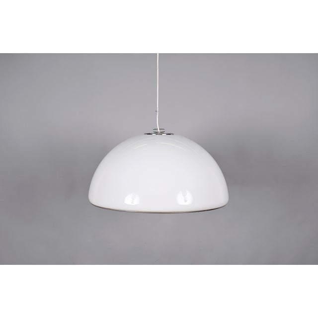 Fantastic mid-century Guzzini metal and white acrylic glass chandelier. Guzzini designed this fantastic piece in Italy...