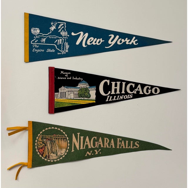 Felt pennants featuring American iconic places were primarily used as popular, affordable souvenirs and travel mementos,...