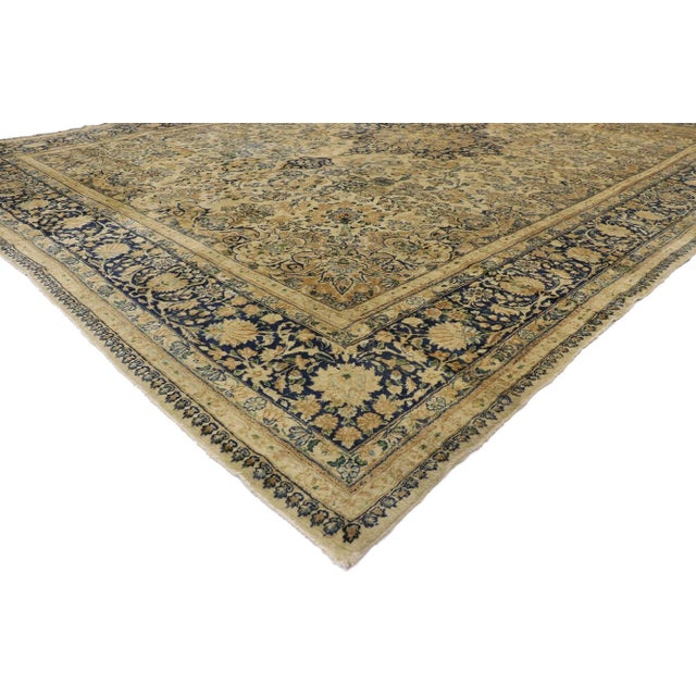 73582 Antique Persian Kerman Rug, 10'00 x 14'01. With a timeless floral pattern and rustic sensibility with a hint of...