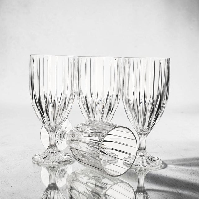 This set of four Mikasa Park Lane crystal iced tea or water goblets was produced in Japan during the Late 20th Century....