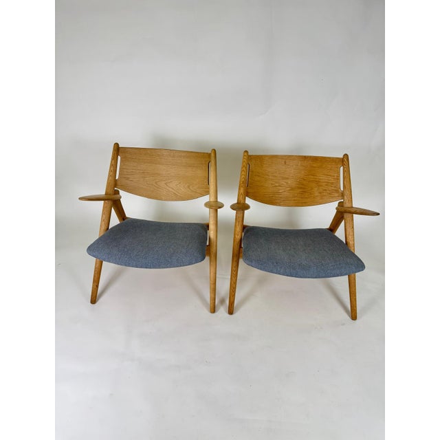 This rare ch28 'sawbuck chair' was designed in the 1950s by hans j. Wegner for carl hansen & søn and is now a true...