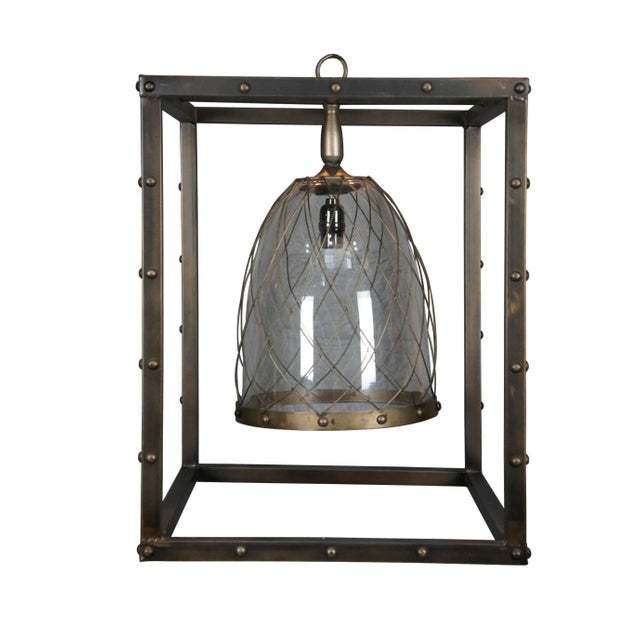 Vintage Karlin pendant swag light / chandelier. Features a modern / industrial style riveted rectangular frame around a...
