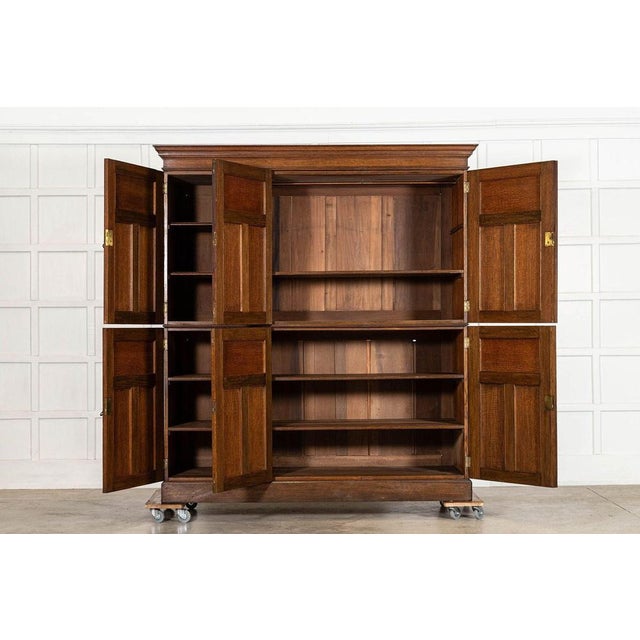 Circa 1895 large 19thc english oak housekeepers cupboard together w194 x d66.5 x h213.5 cm base w186 x d62 x h106.5 cm...