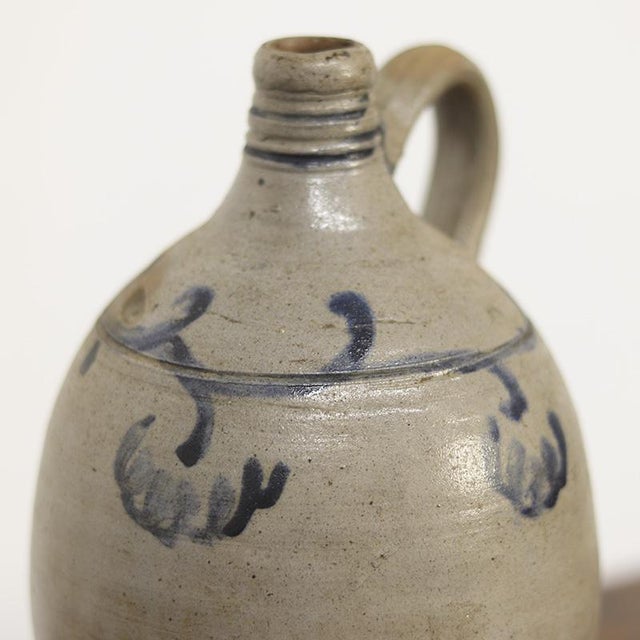 This beautiful decorative earthenware jug dates from Germany, mid-19th century. The jug is finished in a typical shade of...
