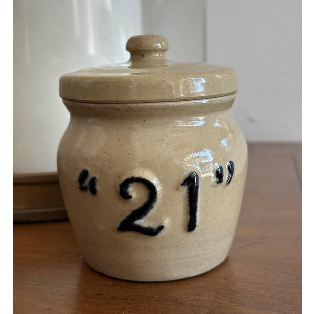 A charming and authentic piece of New York dining history, this vintage stoneware lidded condiment jar comes from the...