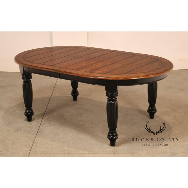 Quality Oskar Huber Dining Table Featuring A Warm Two-Tone Finish With A Plank-Style Oval Top And Contrasting Dark Apron....