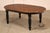 Quality Oskar Huber Dining Table Featuring A Warm Two-Tone Finish With A Plank-Style Oval Top And Contrasting Dark Apron....
