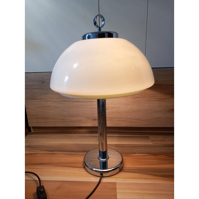 The table lamp is equipped with 2x E27 sockets and is in very good working condition. I have official proof of...