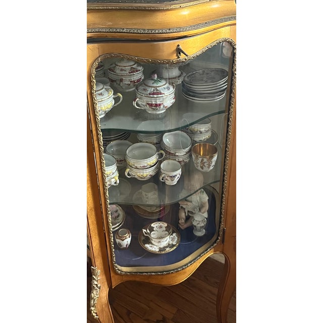 This elegant piece of furniture is designed for showcasing collectibles. The piece itself is magnificent and came from a...